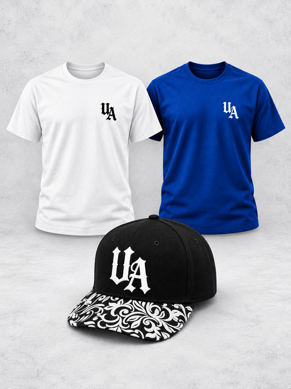 Urban Avenue Weekend Pack with two Essentials T-shirts and the black-and-white patterned UA baseball cap