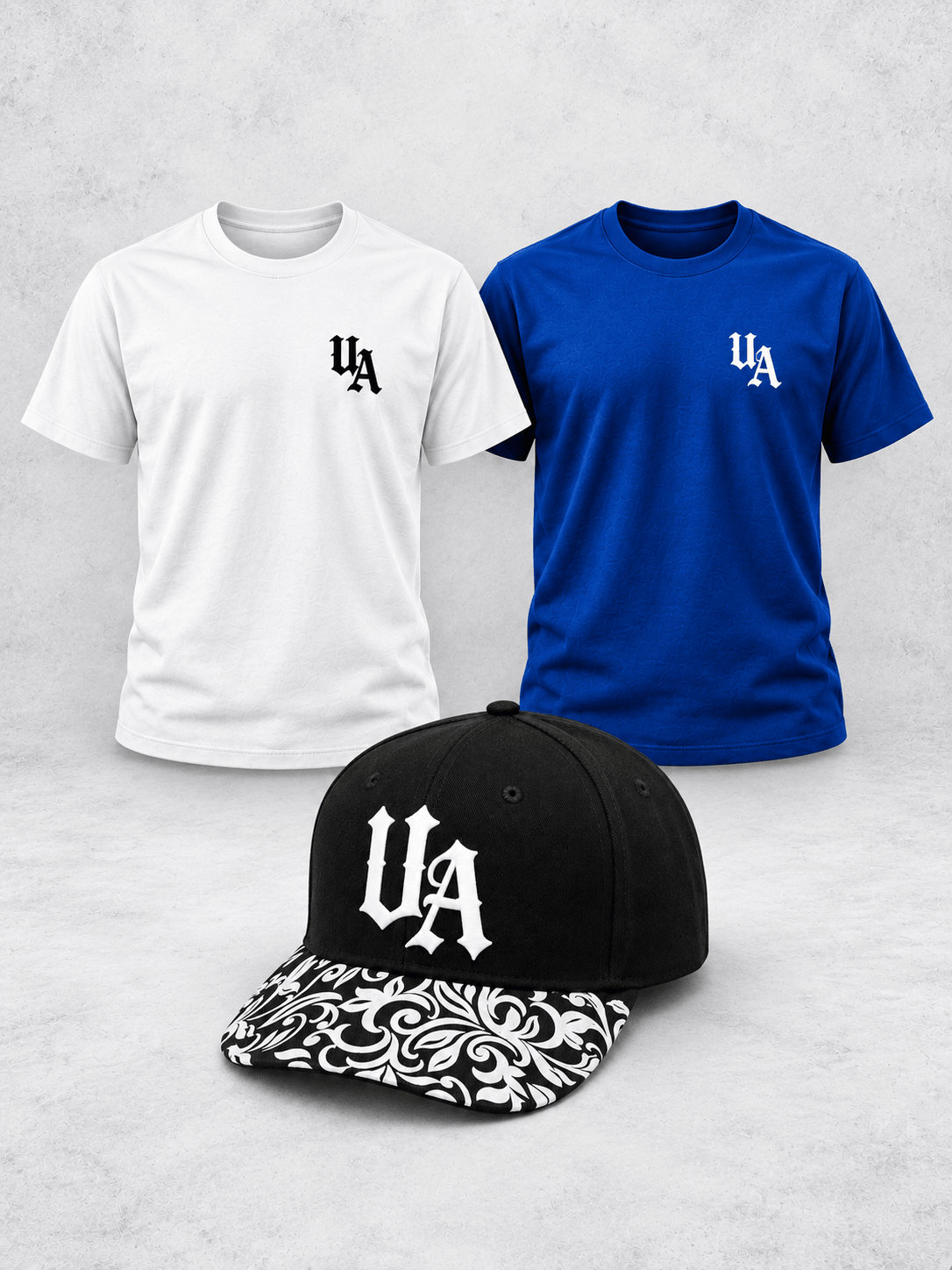 Urban Avenue Weekend Pack with two Essentials T-shirts and the black-and-white patterned UA baseball cap